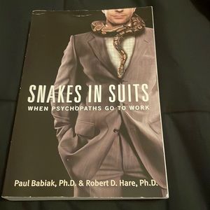 Snakes In Suits